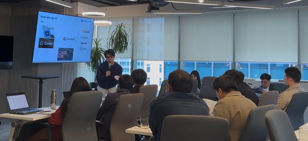 Amigda founder Engr. Garcia teaching an introductory AI session in a professional setting.